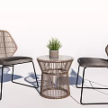 Modern Rattan Table and Chair Set with Metal Frame Gray Cushion and Small Plant