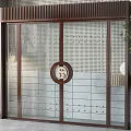 Elegant Wooden Double Doors Featuring Lattice Panels And Circular Ornament