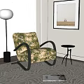 Floral Pattern Accent Chair With Black Curved Armrests Small Round Side Table And Floor Lamp