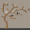 Tree Shaped Wooden Bookshelf With Multiple Branches Holding Books And Decorative Items