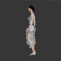 Woman in White Layered Dress with Purple Waistband Long Sleeves White Shoes Against Gray Background