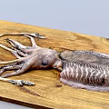 Giant Squid With Striped Body And Long Tentacles On Wooden Surface