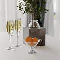 Ornamental Decor Set With Champagne Glasses Green Plant Glass Vase And Orange Glass Bowl