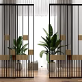 Modern Glass Room Divider With Vertical Stripes Black Frame Round Handles And Plants In Interior