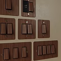 Elegant Poliform Modern Wooden Switch Panels With Multiple Switches And Sockets