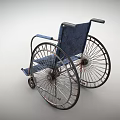 Sturdy Mobility Wheelchair Featuring Blue Padded Seat Metal Frame And Large Wheels