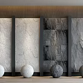 Contemporary Wall Paneling Design With Textured Surfaces And Decorative Stone Balls 3d model