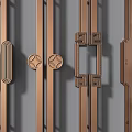 Various Classic Design Door Handles Featuring Decorative Patterns in Bronze Finish for Home Decor