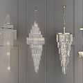 Modern Crystal Chandeliers With Different Geometric Designs Hanging On Gray Wall For Interior