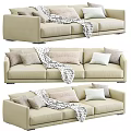 Modern Beige Three Seater Sofa With Soft Fabric Cushions And Throw Blanket 3d model