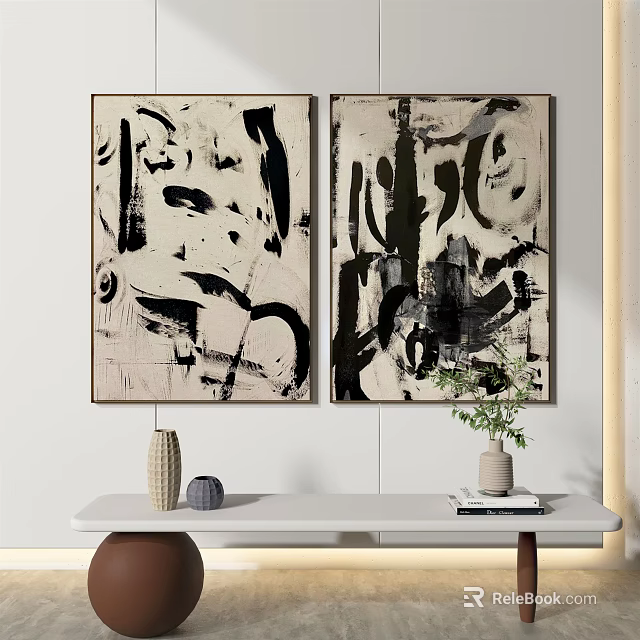 Two Black and White Abstract Paintings Hanging on Wall With Vase and Plant on Table 3d model 