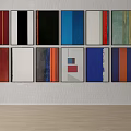 Multiple Colorful Abstract Paintings With Geometric Shapes And Diverse Hues On Wall