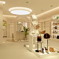 Modern Clothing Store Window Display With White Outfit Mannequins Green Plants And Lighting