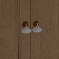 Elegant Fan Shaped Metal Handles On Wooden Cabinet Doors With Brown Accents