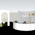 Elegant Floral Display for Drink Bar with Silver Drapery White Counter and Floral Arrangements