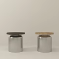 Modern Stools Featuring Silver Metal Base And Round Black Wooden Top Design