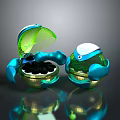 Blue Green Transparent Robot Shaped Plant Seed Containers With Open Lid And Black Seeds