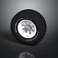 Black Car Tire With Silver Alloy Rim And Tread Pattern Design