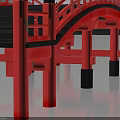 Red Japanese Style Arch Bridge With Black Deck Railing And Decorative Posts