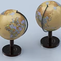 Decorative Globe Ornament Set With Two Beige Globes Dark Bases And Colored Maps