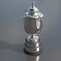 Silver Decorative Two Handled Award Trophy With Top Ornament And Engraved Base On Gray Surface 3d model