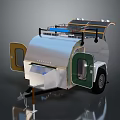Solar Powered Travel Trailer With Silver Exterior Green Doors And Modern Design