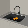 Modern Kitchen Sink With Black Faucet Running Water And Orange Fruits In White Countertop