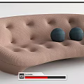 Brown And White Multi Seater Sofa With Tufted Design And Round Cushions
