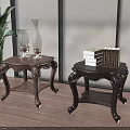 Two Classic Wooden Side Tables With Carved Legs Green Plant Glass Vases And Books
