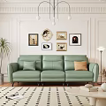 Modern Green Leather Three-Seater Sofa With Wall Decorative Paintings Floor Lamp And Palm Plant