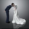 Wedding Cake Topper With Newlywed Couple Kissing In Groom Suit And Bride Wedding Dress