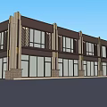 Modern Commercial Complex Exterior With Large Glass Windows Decorative Columns And Canopies