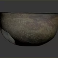 Ancient Sculpted Bowl Featuring Intricate Decorative Patterns And Bronze Patina