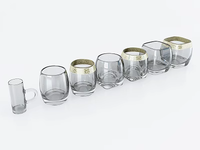 Set Of Glass Drinking Cups With Gold Rim Decoration In Various Sizes Arranged 3d model