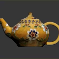 Decorative Yellow Teapot With Vibrant Floral Patterns And Golden Handle Spout