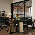 Modern Black Round Dining Table And Chairs With Beige Seat Cushions Sunflowers Bread Green Apples