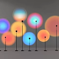 Multiple Modern Floor Lamps Featuring Colorful Light Projection and Vibrant Hues