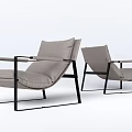 Two Modern Light Gray Leisure Chairs Featuring Black Metal Frames And Soft Cushions