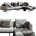 Gray Sectional Sofa With Multiple Decorative Pillows And Soft Throw Blanket For Modern Living Room