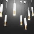Modern White and Gold Cylindrical Pendant Lights Hanging in Minimalist Space