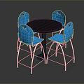 Black Round Dining Table With Four Blue Chairs And Metal Frames