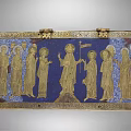 Antique Ornate Decorative Box Featuring Intricate Golden Figure Reliefs On Blue Background