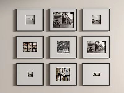 Framed Black And White Photographs Arranged In Grid On White Wall 3d model