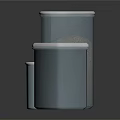 Metal Storage Tins With White Lids Holding Granular Contents On Dark Reflective Surface
