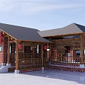 Traditional Chinese Style Homestay Building With Red Brick Walls Wooden Structure And Red Lanterns