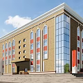 Multi Story Building With Beige Exterior Blue Glass Curtain Wall And Arched Windows