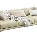 Modern Beige Three Seater Sofa With Soft Fabric Cushions And Throw Blanket 3d model