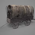 Vintage Covered Wagon With Tattered Canvas Top And Wooden Wheels