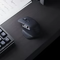 Ergonomic Wireless Mouse On Modern Desktop With Mechanical Keyboard And Notebook Paper Setup