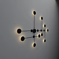 Modern Wall Lamp With Black Metal Frame And Illuminated Circular Lights Mounted On White Wall